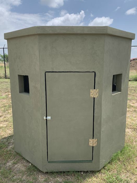 6x6 octagon insulated deer blind, front view showing the door and two corner windows