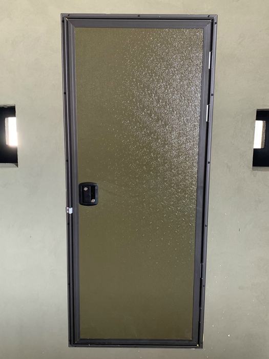 Deluxe DeerView door — a powder-coated RV-style door with a keyed paddle latch